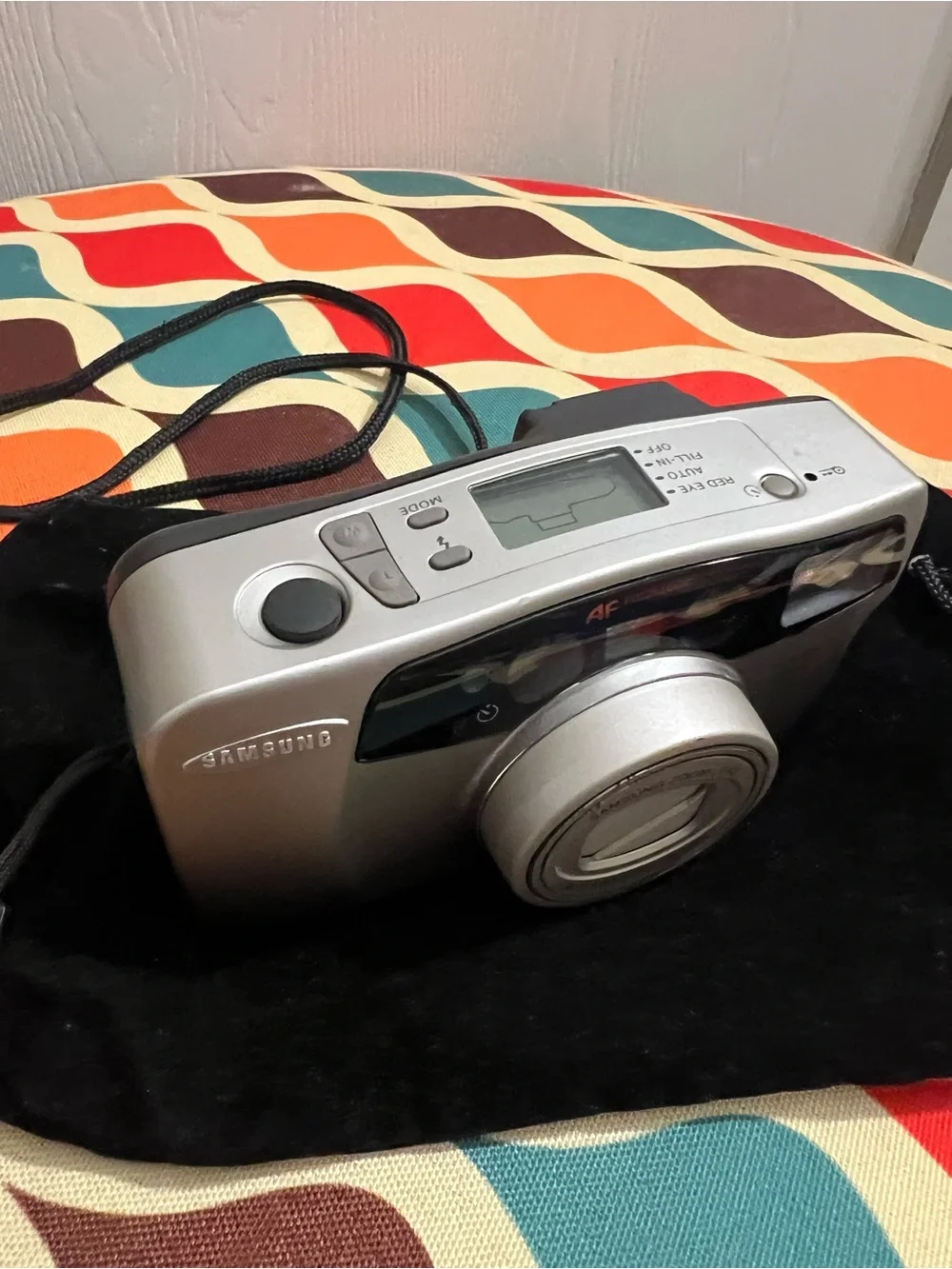 Vintage Samsung Slim Zoom 115A Panorama 35mm film camera with a 38-115mm lens